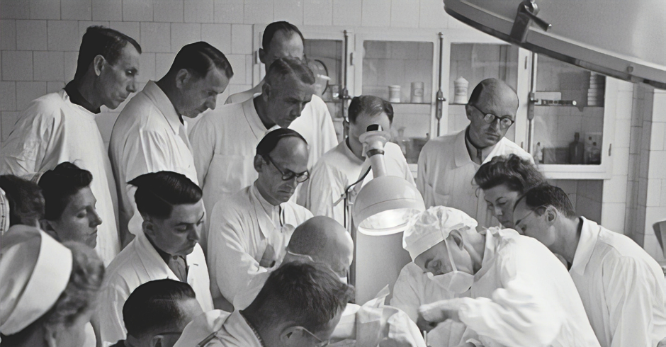 medical staff observing a surgery